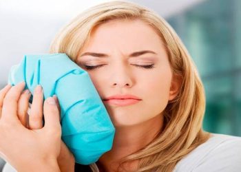 The woman finds a toothache relief tips