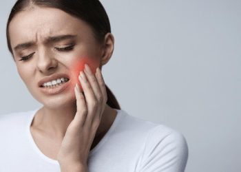 The girl has symptoms of dental infection